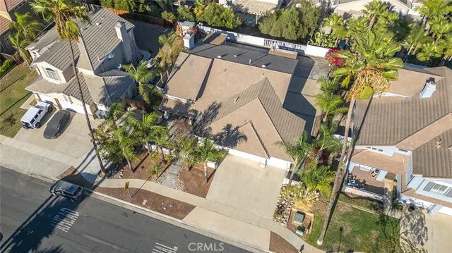 an aerial view of a town with couple of houses