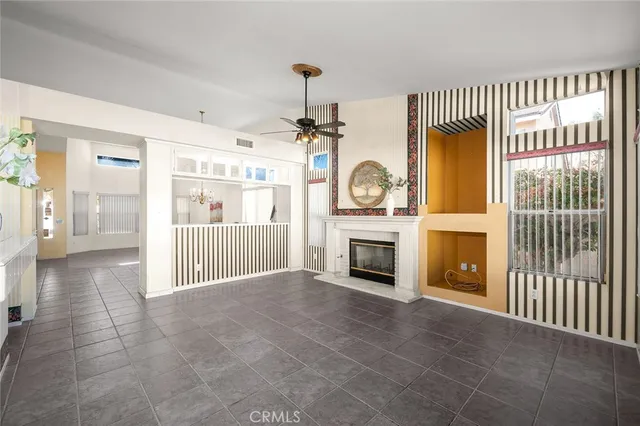 a view of a hallway with entryway wooden floor and front door
