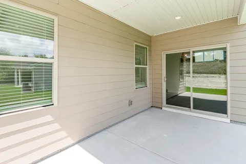 a front view of a house with yard