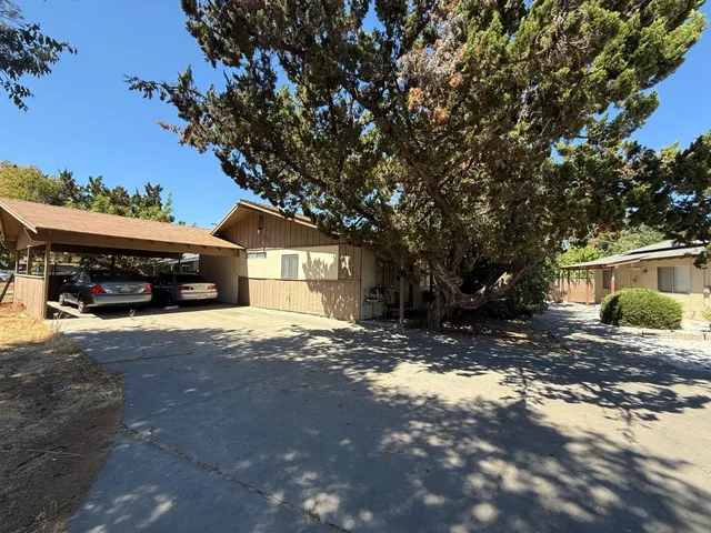 a car parked in front of a house