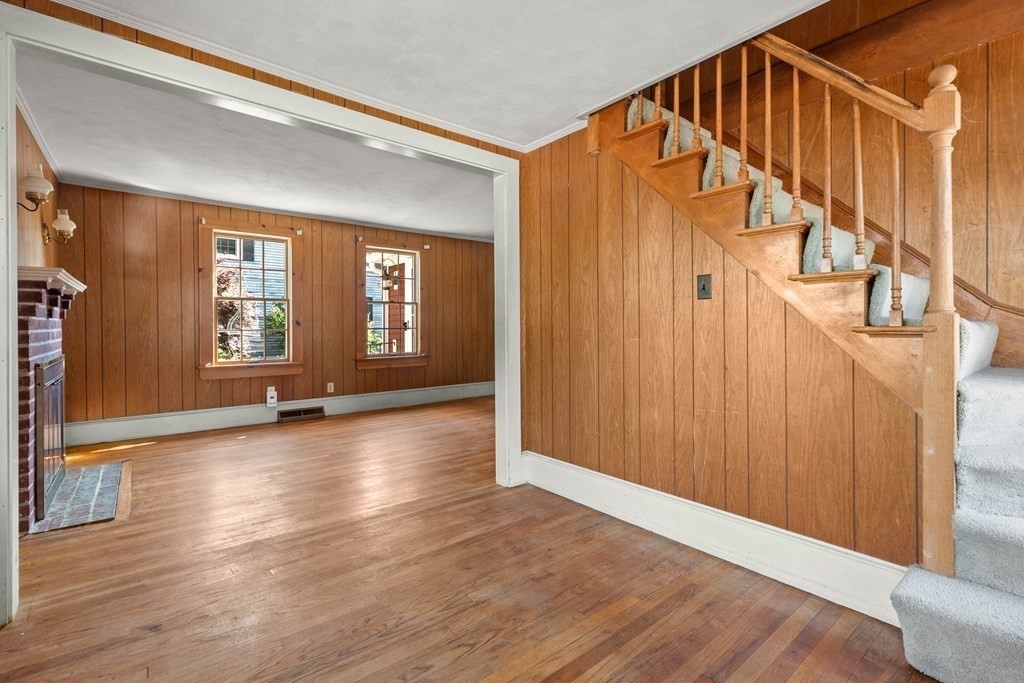 170 County Road Ipswich, MA 01938 - Photo 13 of 41 an empty room with wooden floor and windows