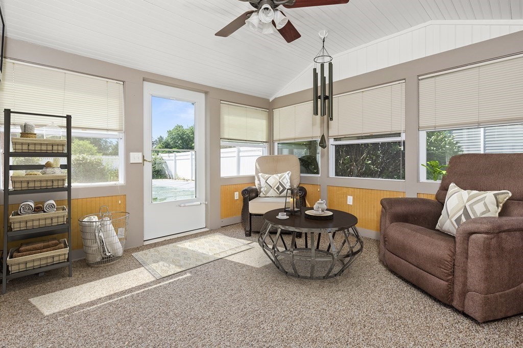 170 County Road Ipswich, MA 01938 - Photo 27 of 41 a living room with furniture and a floor to ceiling window