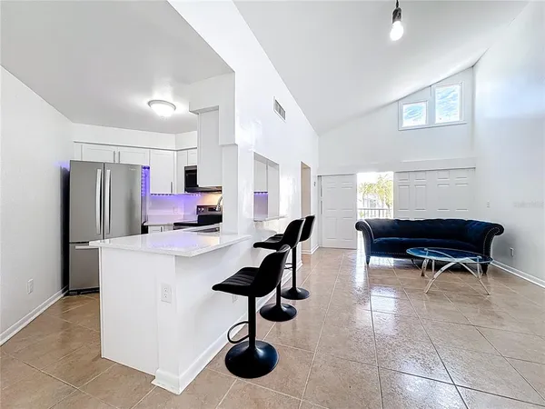 a workspace with furniture and a window