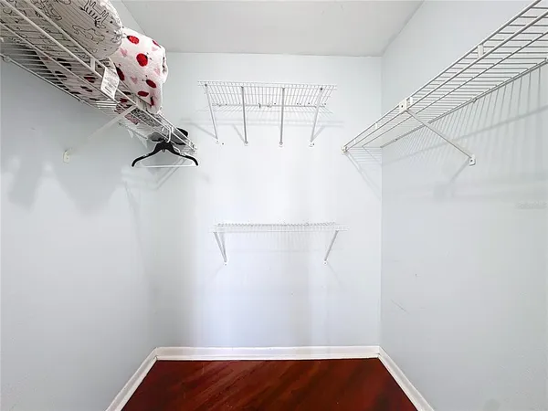 a view of walk in closet with window
