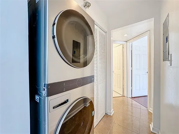 a view of a hallway with washer and dryer