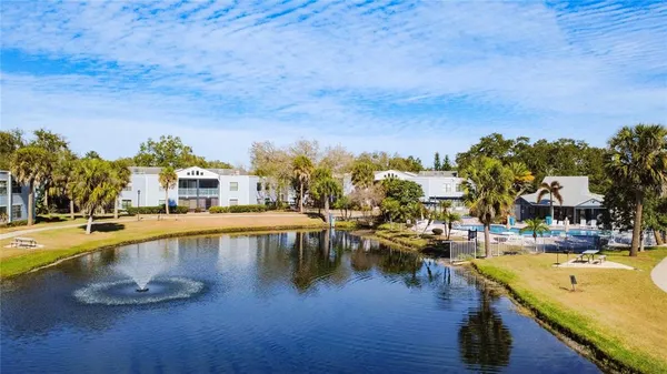 a view of swimming pool with outdoor seating