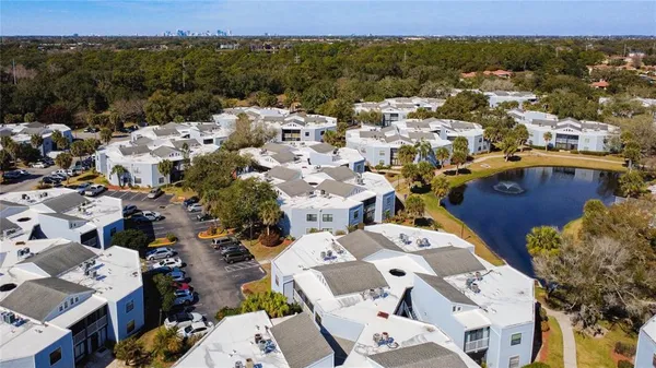 an aerial view of a city with lots of residential buildings