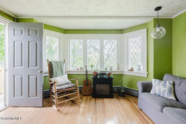 a view of a kitchen and dining room