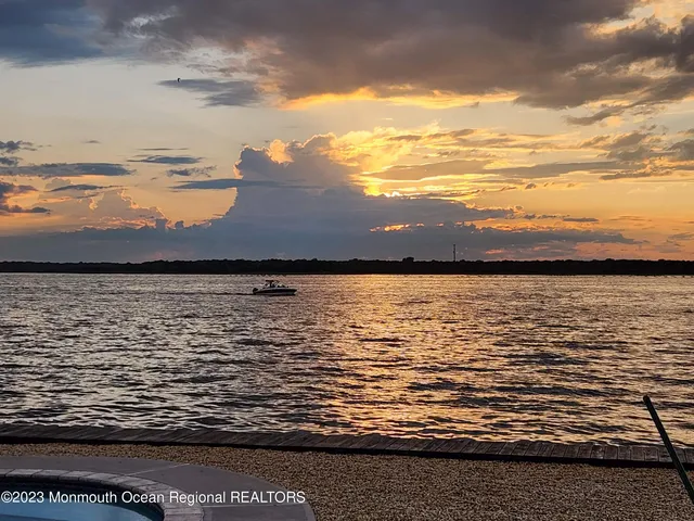 a view of a city with mountains in the background