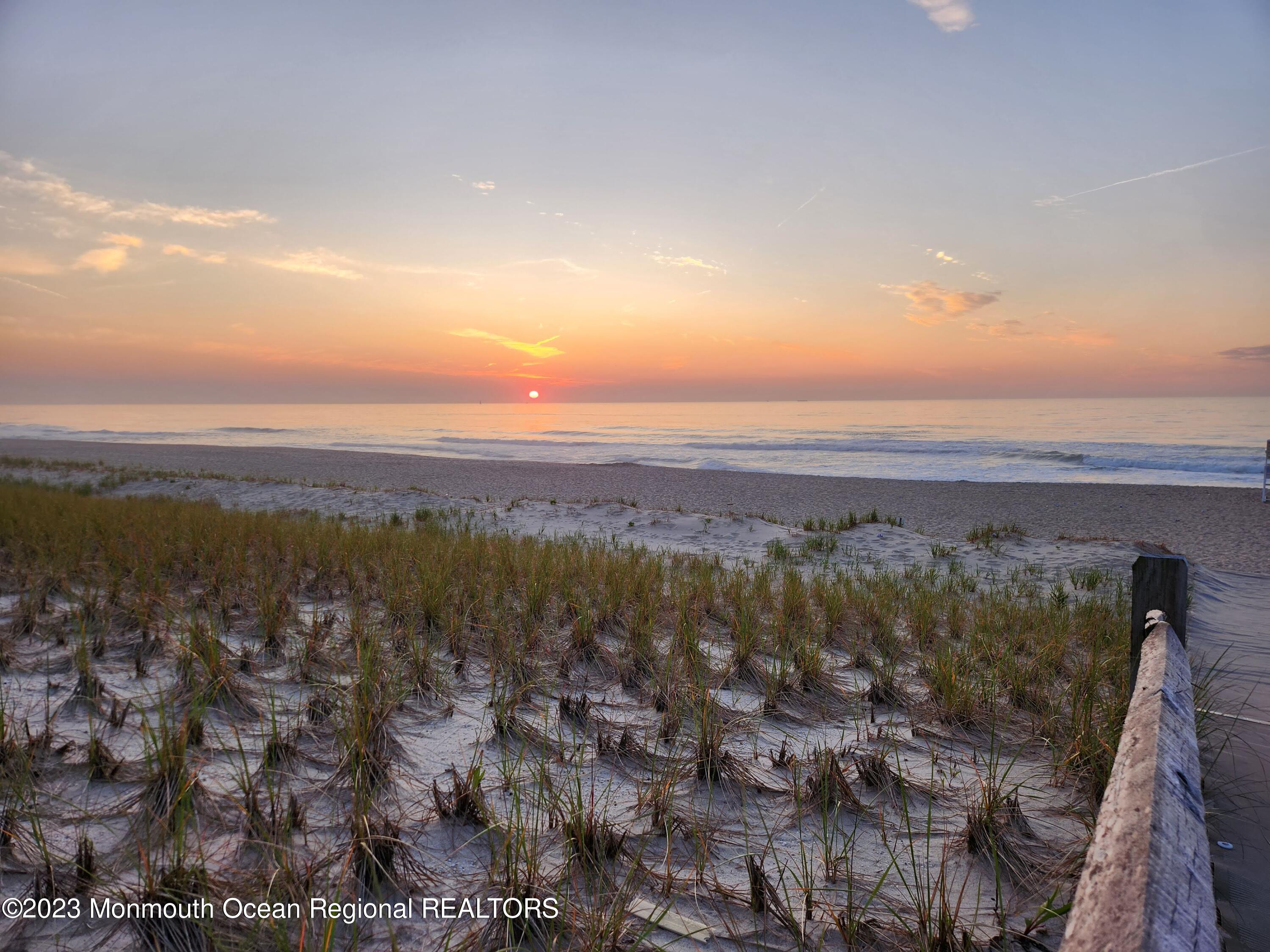 127 Curtis Point Drive Mantoloking, NJ 08738 - Photo 34 of 34 a view of a city with mountains in the background