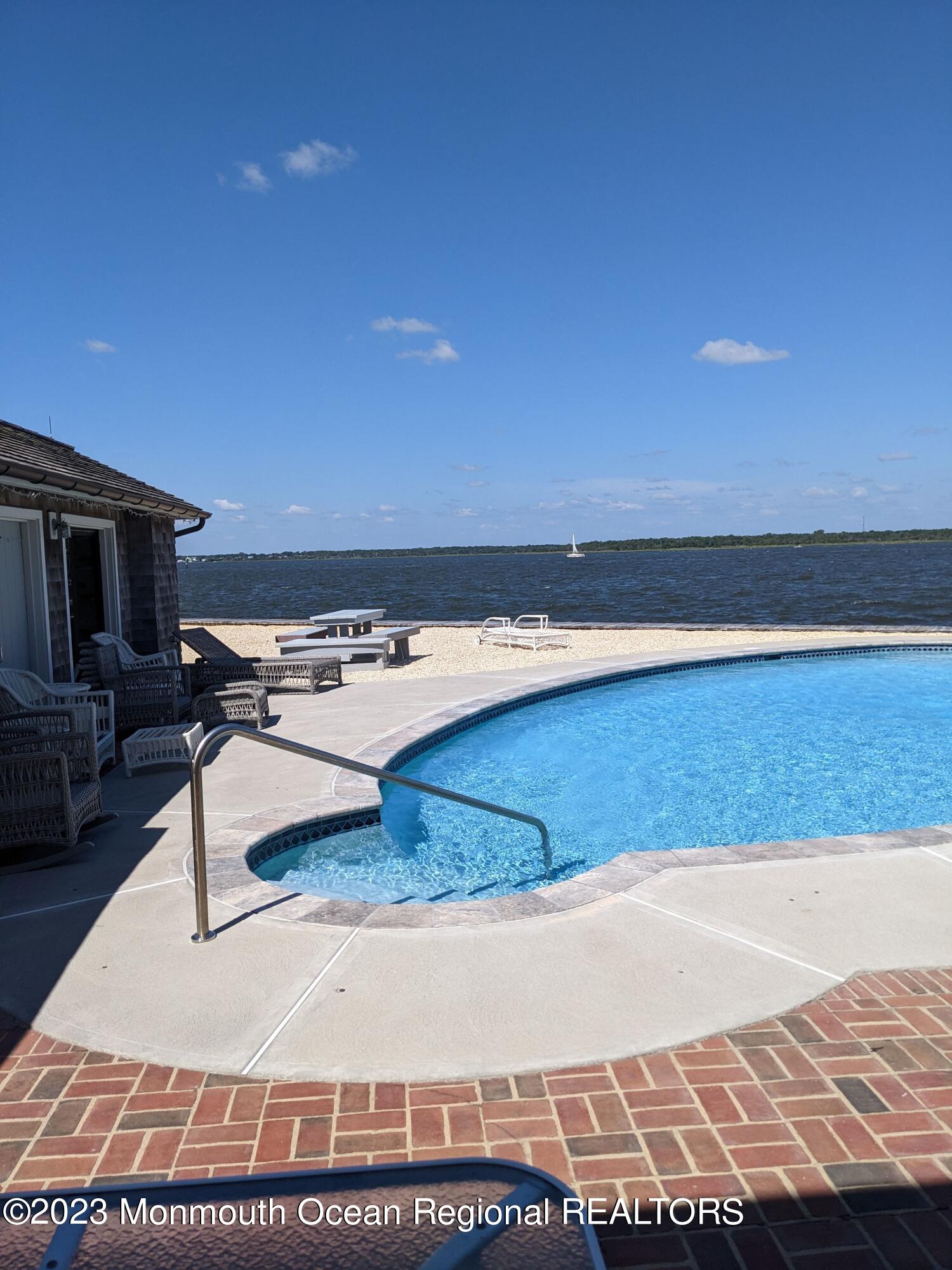 127 Curtis Point Drive Mantoloking, NJ 08738 - Photo 4 of 34 a living room with furniture