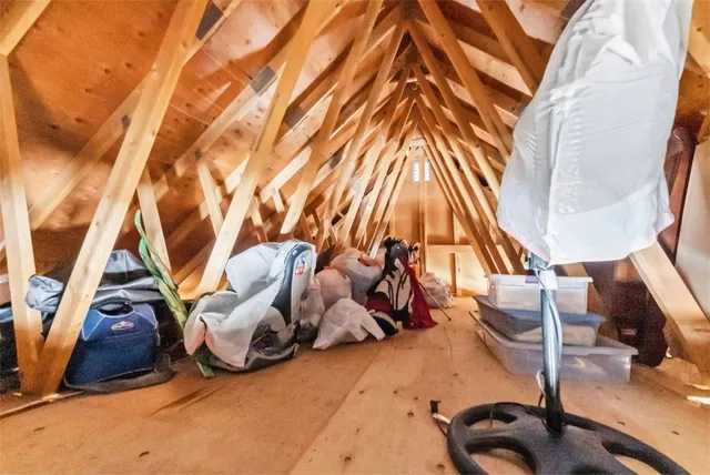 an aerial view of a house with a mountain view