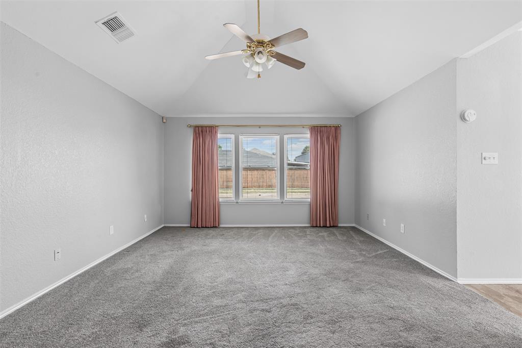 7301 Wagonwheel Road Fort Worth, TX 76133 - Photo 20 of 34 wooden floor in an empty room with a window