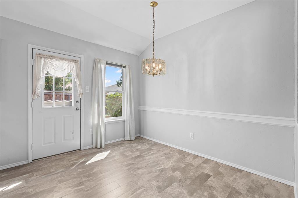 7301 Wagonwheel Road Fort Worth, TX 76133 - Photo 21 of 34 a view of an empty room with a window