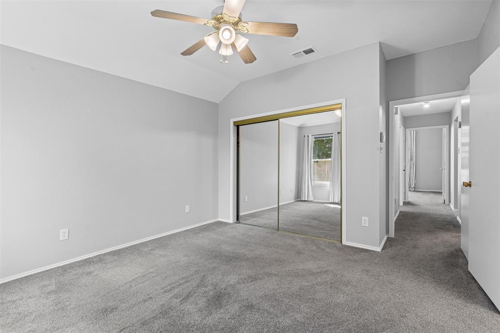 7301 Wagonwheel Road Fort Worth, TX 76133 - Photo 10 of 34 a view of an empty room with a window