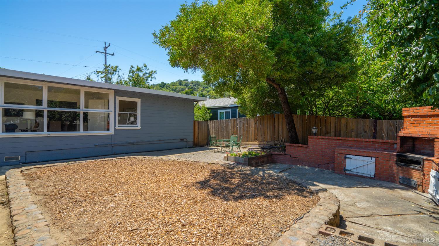 38 Bret Avenue San Rafael, CA 94901 - Photo 45 of 52 a backyard of a house with seating space