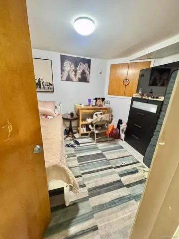 a view of a patio with a table and chairs