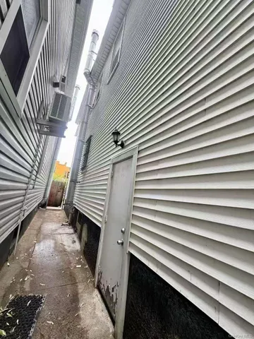 a kitchen that has a lot of cabinets in it and appliances