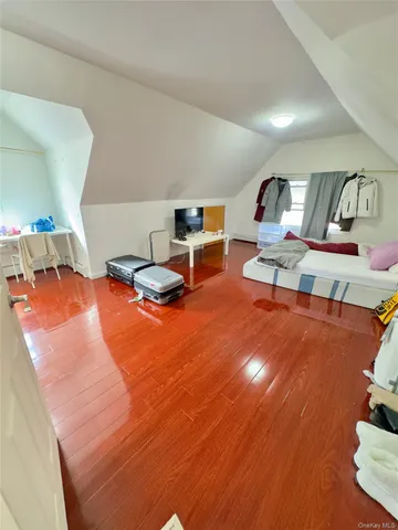 a room with gym equipment and a table