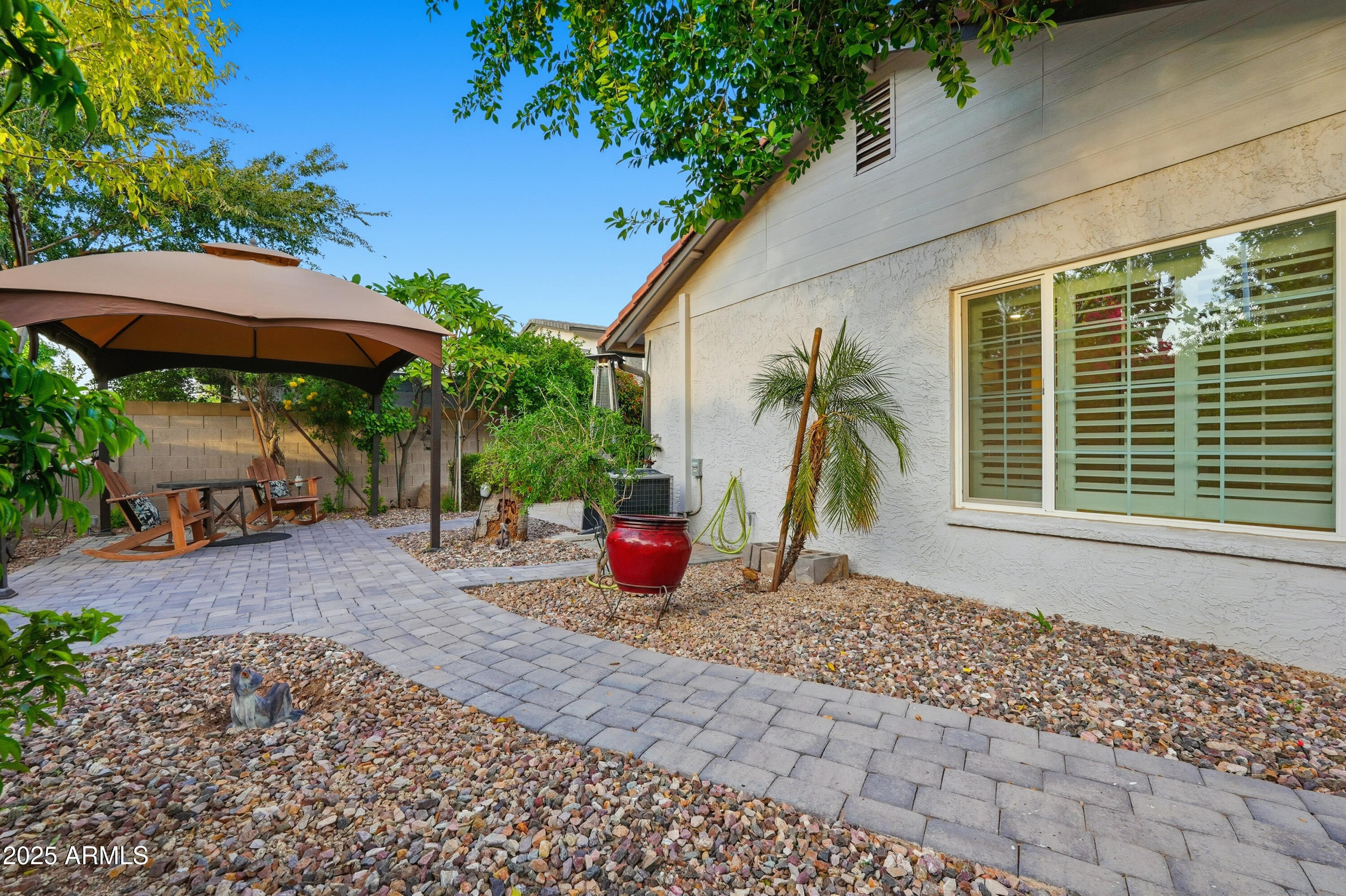 5632 South Jolly Roger Road Tempe, AZ 85283 - Photo 21 of 35 a house view with a backyard space