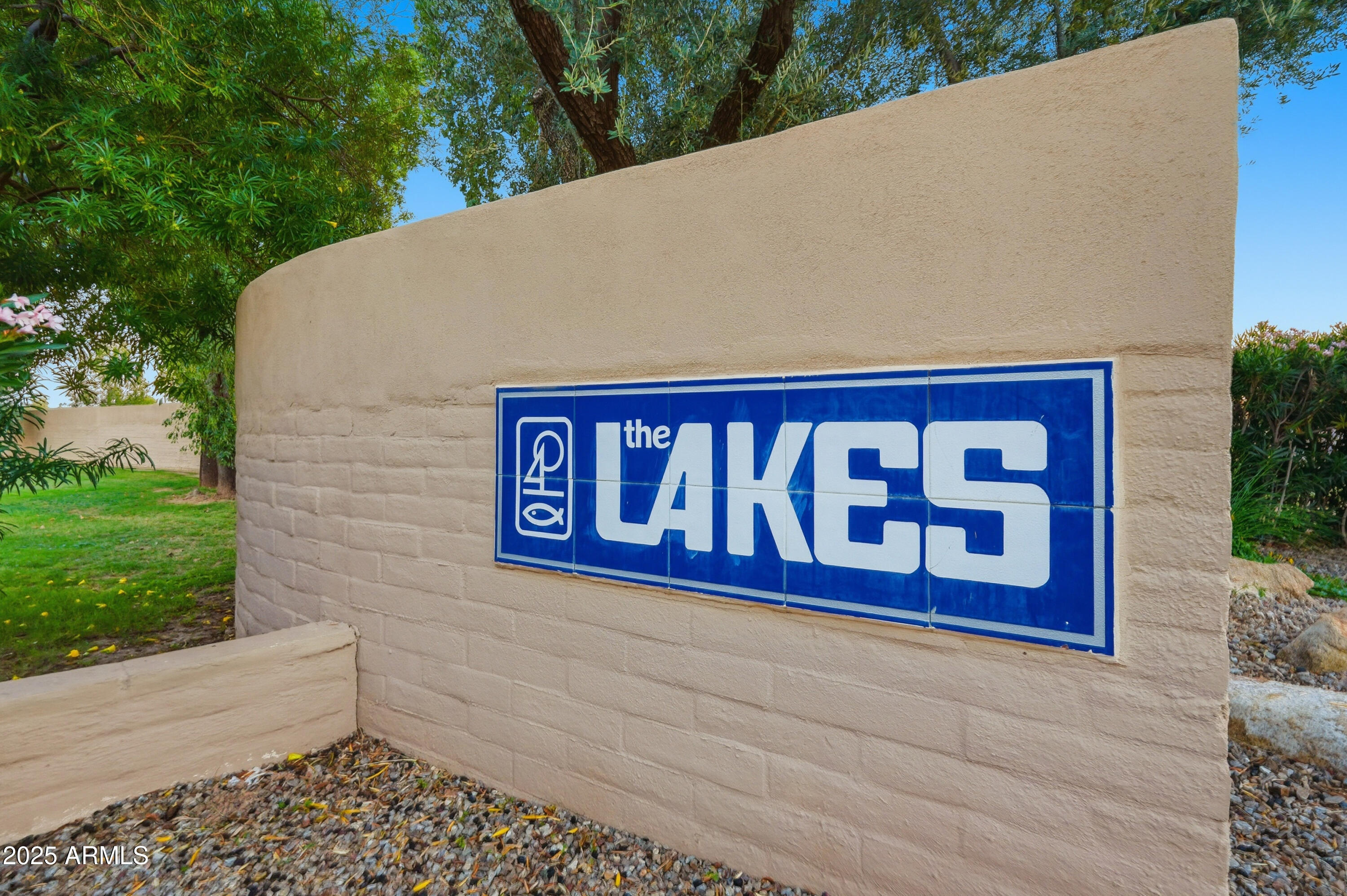 5632 South Jolly Roger Road Tempe, AZ 85283 - Photo 22 of 35 a sign that is on the side of a road