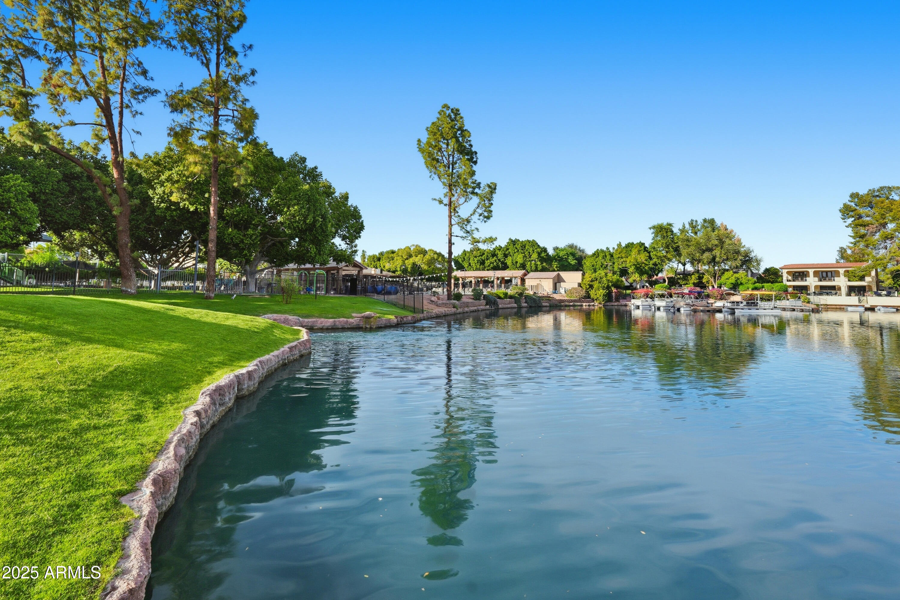 5632 South Jolly Roger Road Tempe, AZ 85283 - Photo 25 of 35 a view of a lake with houses