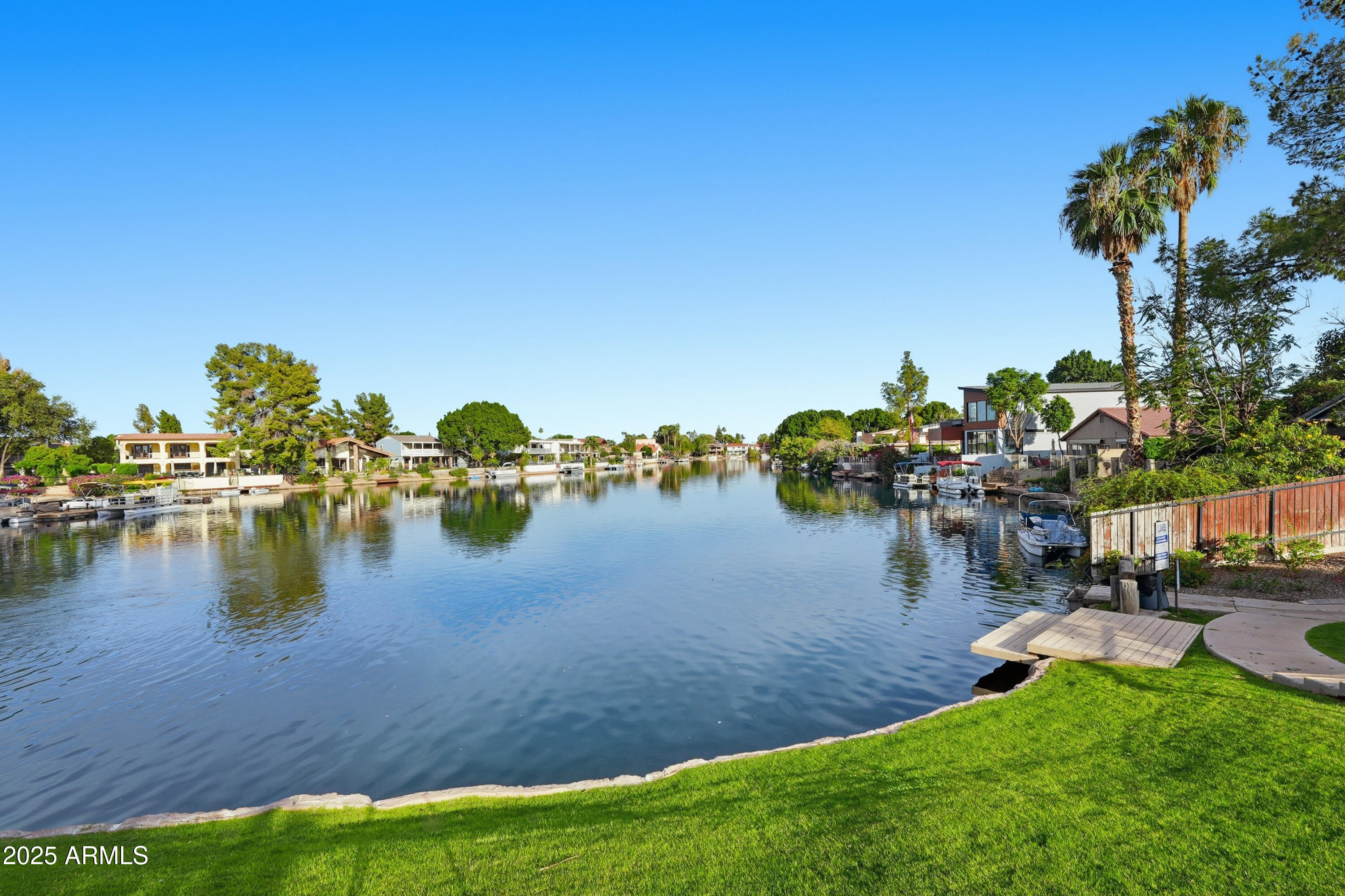 5632 South Jolly Roger Road Tempe, AZ 85283 - Photo 26 of 35 a view of a lake with houses