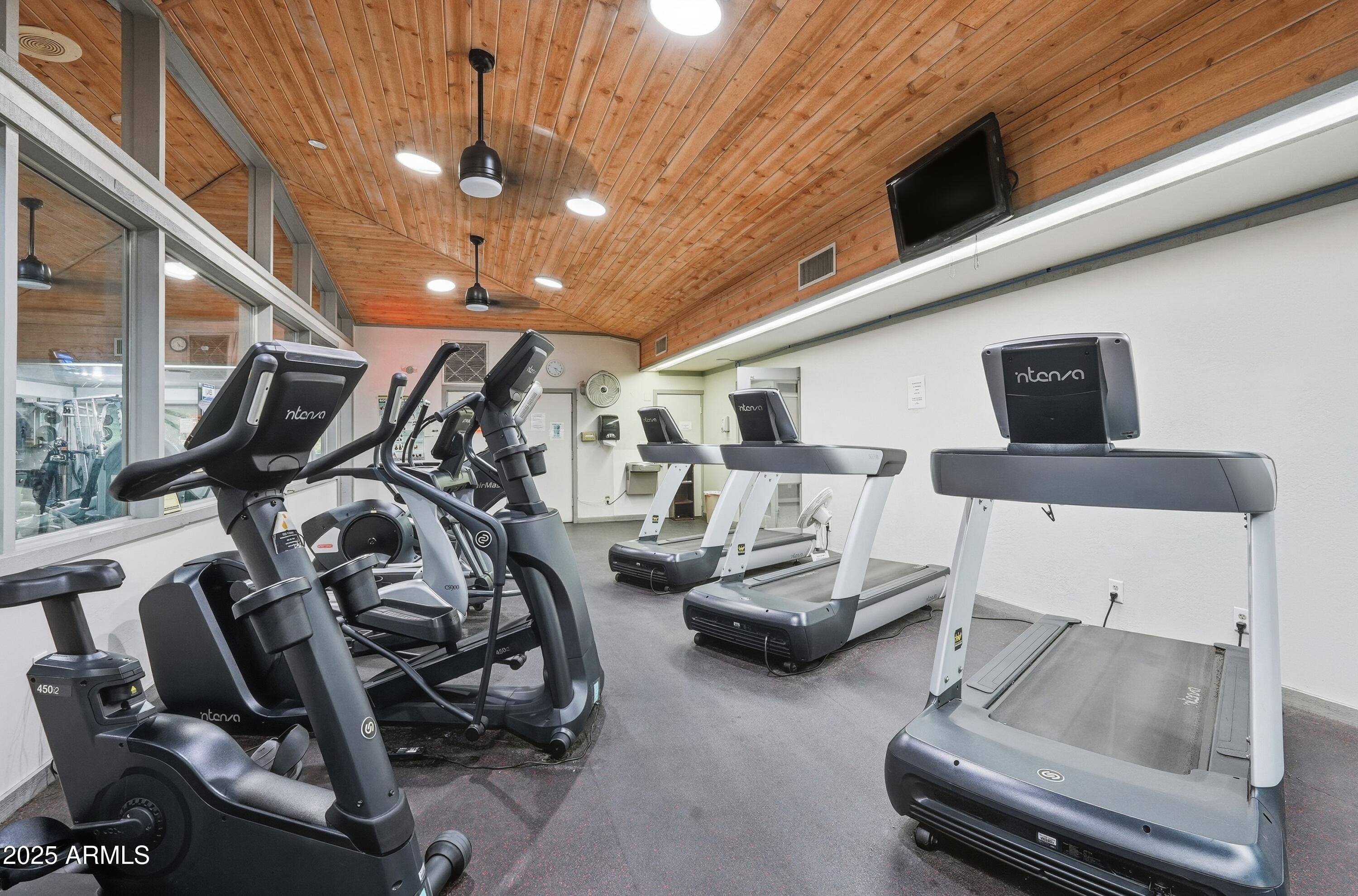 5632 South Jolly Roger Road Tempe, AZ 85283 - Photo 31 of 35 a view of a room with gym equipment