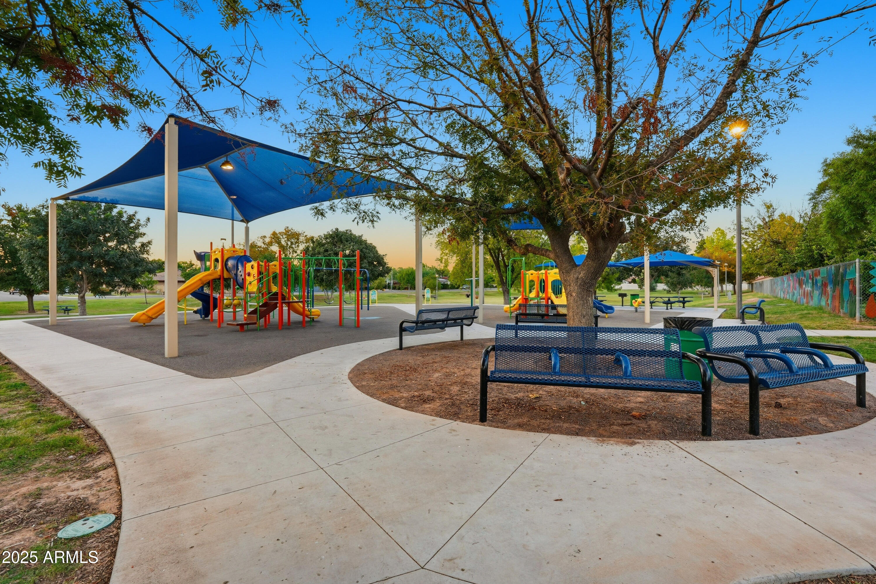 5632 South Jolly Roger Road Tempe, AZ 85283 - Photo 33 of 35 a park view with a bench and a tables