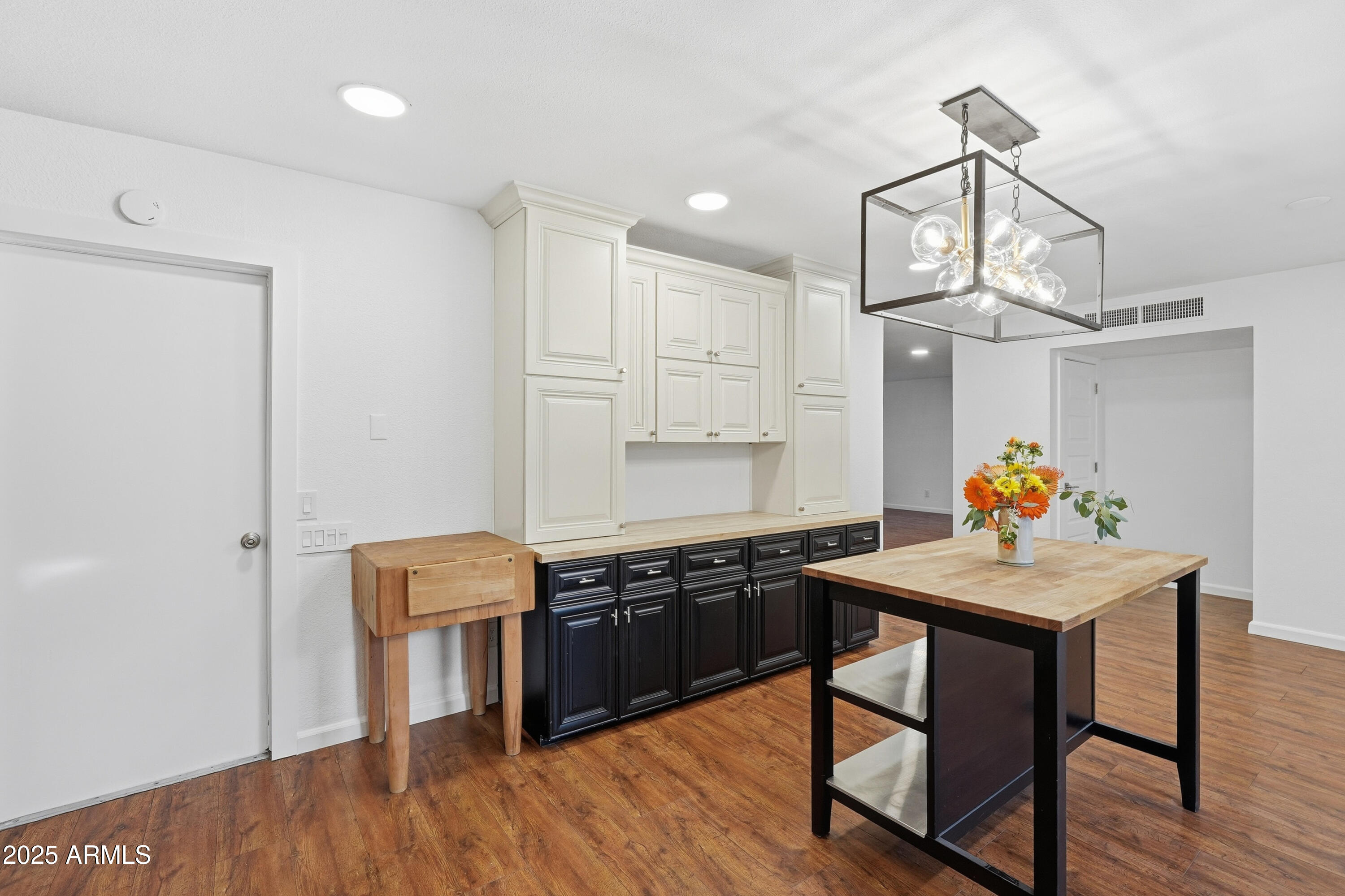 5632 South Jolly Roger Road Tempe, AZ 85283 - Photo 9 of 35 a view of a dining room with furniture and wooden floor