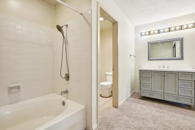 a view of deck with wooden floor and fence and a floor to ceiling window