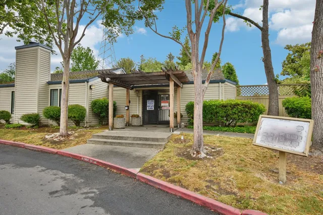 a view of a swimming pool and a yard