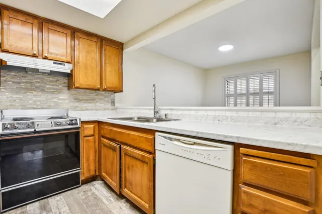 an empty room with a fireplace