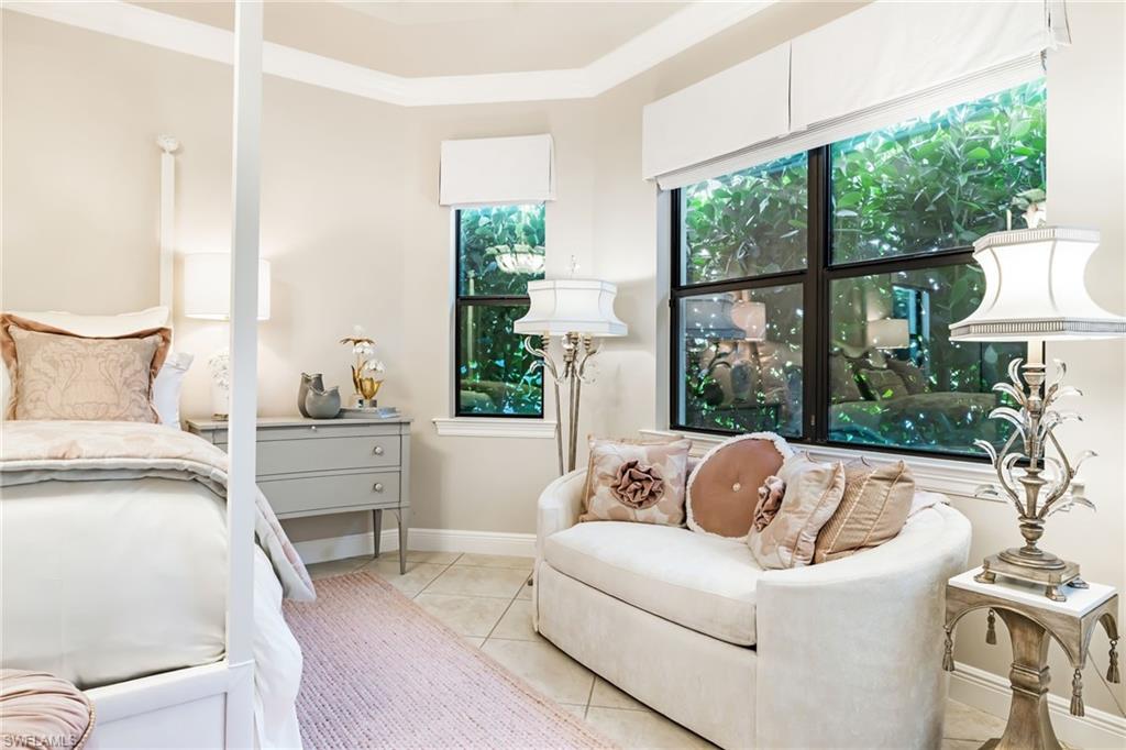 14480 Marsala Way Naples, FL 34109 - Photo 12 of 31 a living room with furniture and a large window