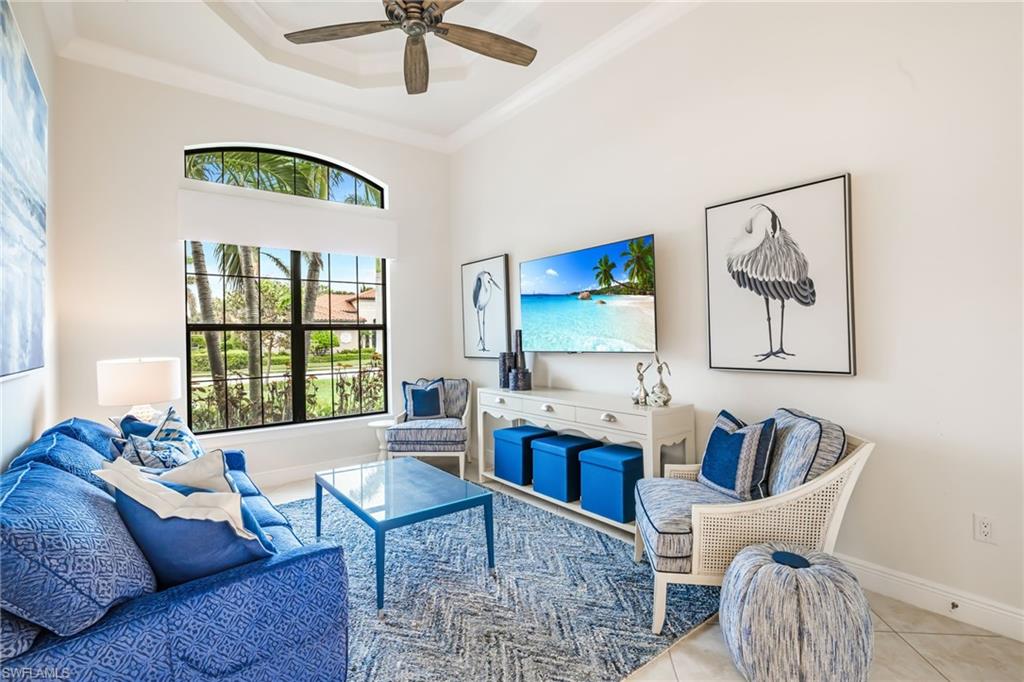 14480 Marsala Way Naples, FL 34109 - Photo 21 of 31 a living room with furniture and a large window