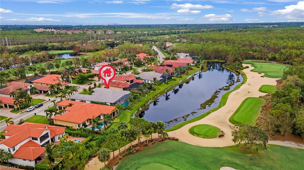 14480 Marsala Way Naples, FL 34109 - Photo 29 of 31 an aerial view of a house with a swimming pool yard and outdoor seating