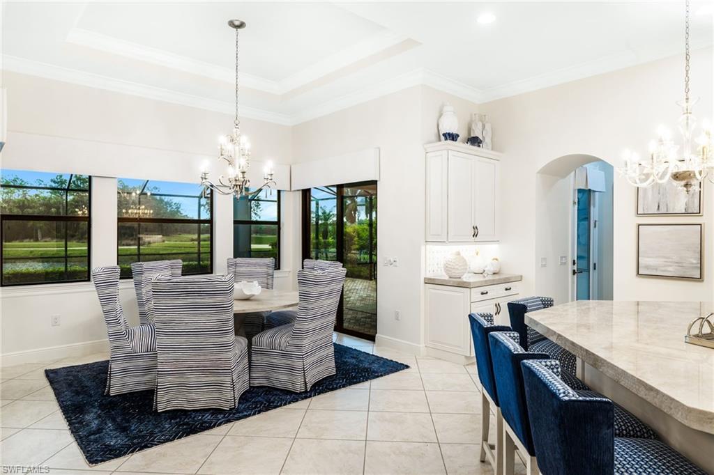 14480 Marsala Way Naples, FL 34109 - Photo 9 of 31 a living room with furniture and a large window