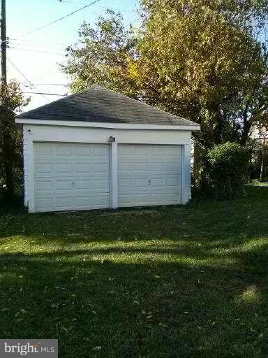 646 Orpington Road Baltimore, MD 21229 - Photo 23 of 30 a front view of house with yard
