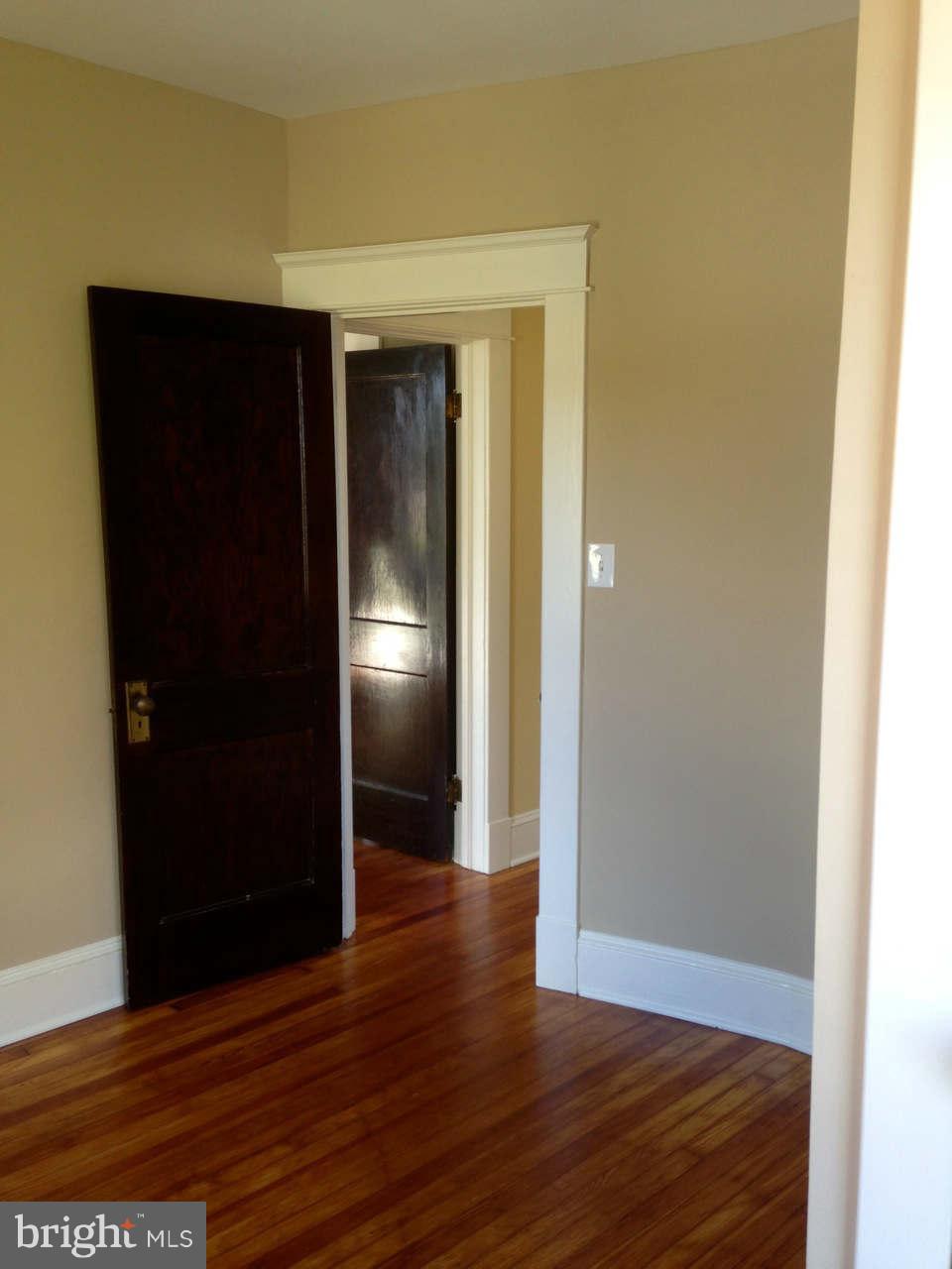 646 Orpington Road Baltimore, MD 21229 - Photo 25 of 30 a view of hallway with wooden floor