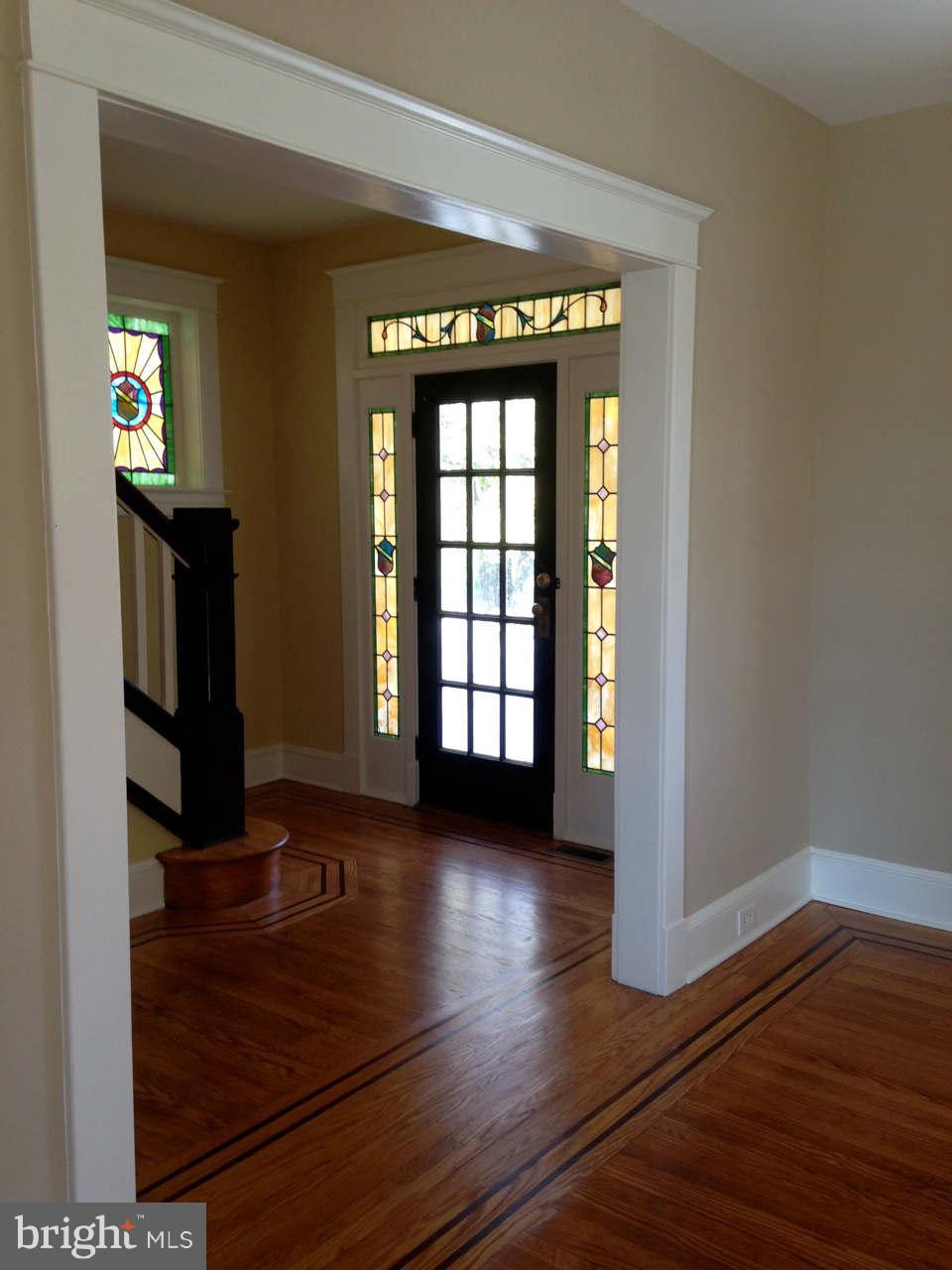 646 Orpington Road Baltimore, MD 21229 - Photo 8 of 30 a view of an entryway with wooden floor