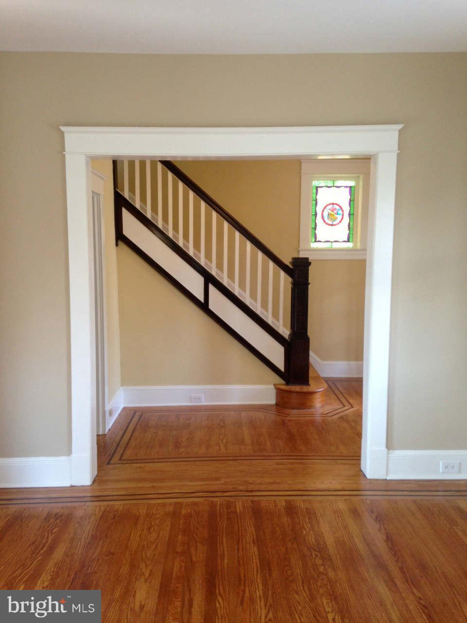 646 Orpington Road Baltimore, MD 21229 - Photo 9 of 30 a view of entryway and hall with wooden floor