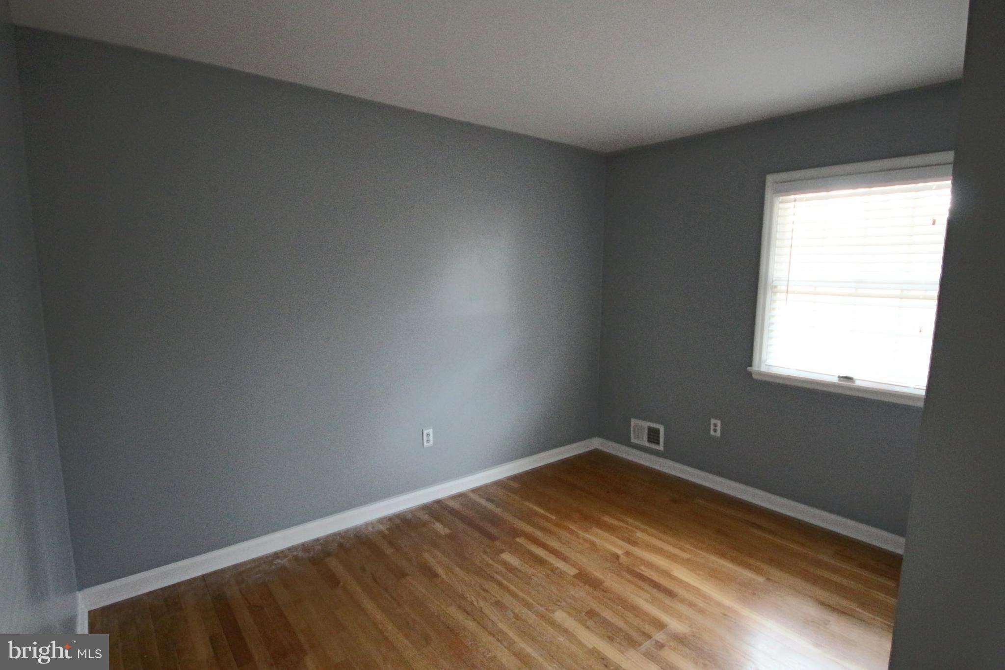 1586 Long Point Road Pasadena, MD 21122 - Photo 11 of 23 Bedroom 2 w/hardwood floors