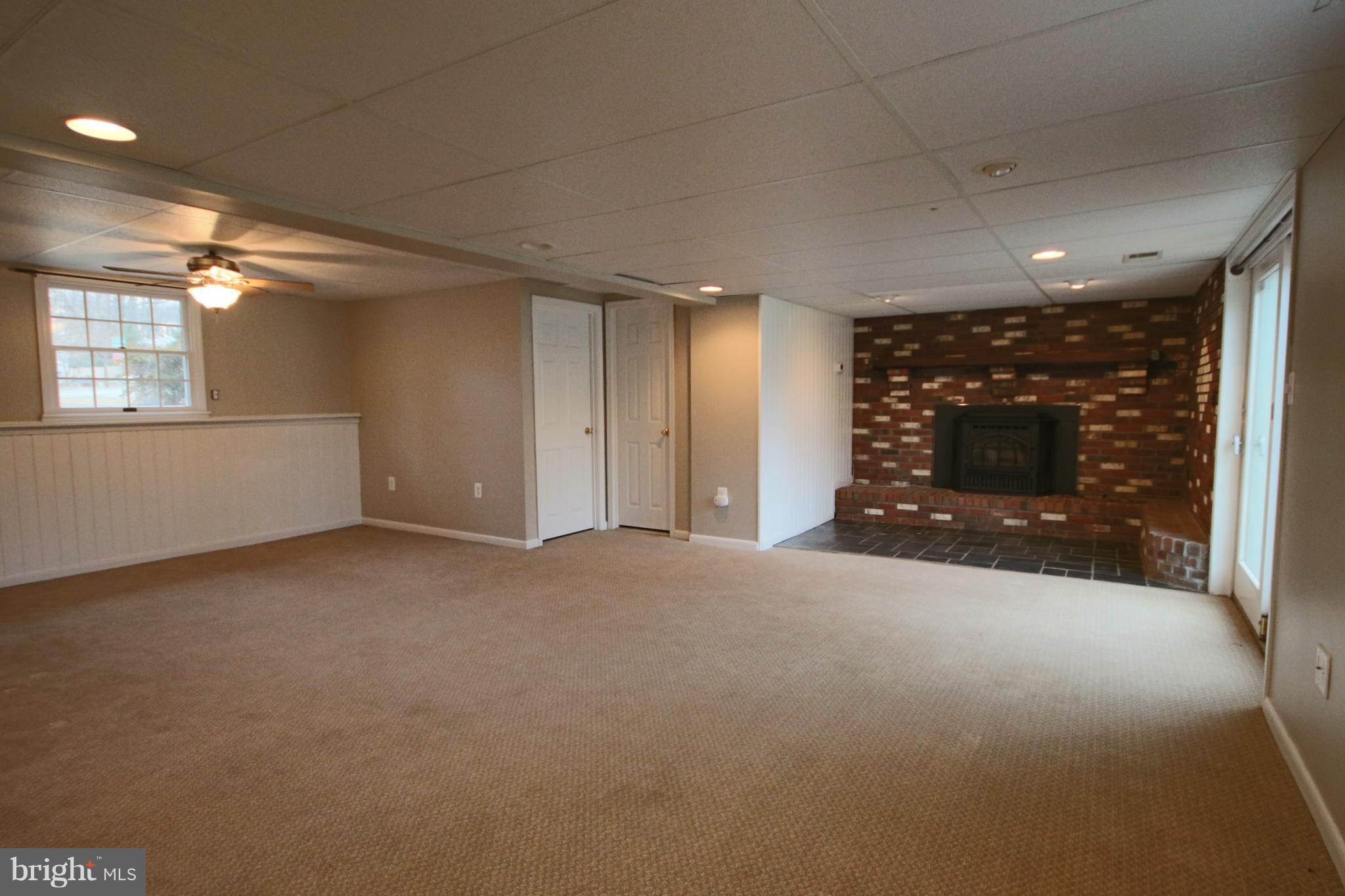 1586 Long Point Road Pasadena, MD 21122 - Photo 14 of 23 Family Room w/frplc and new pellet stove insert
