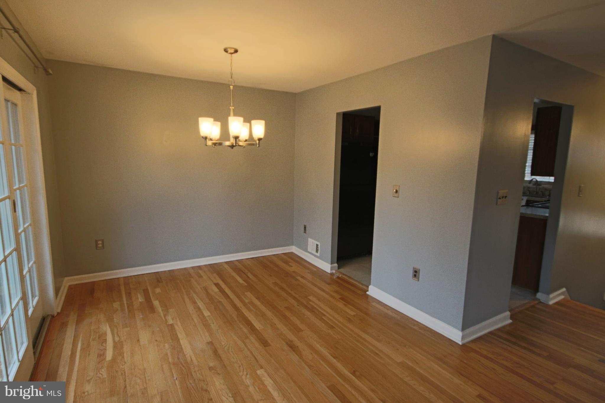 Dining Room w/sliders to deck and hardwood floors