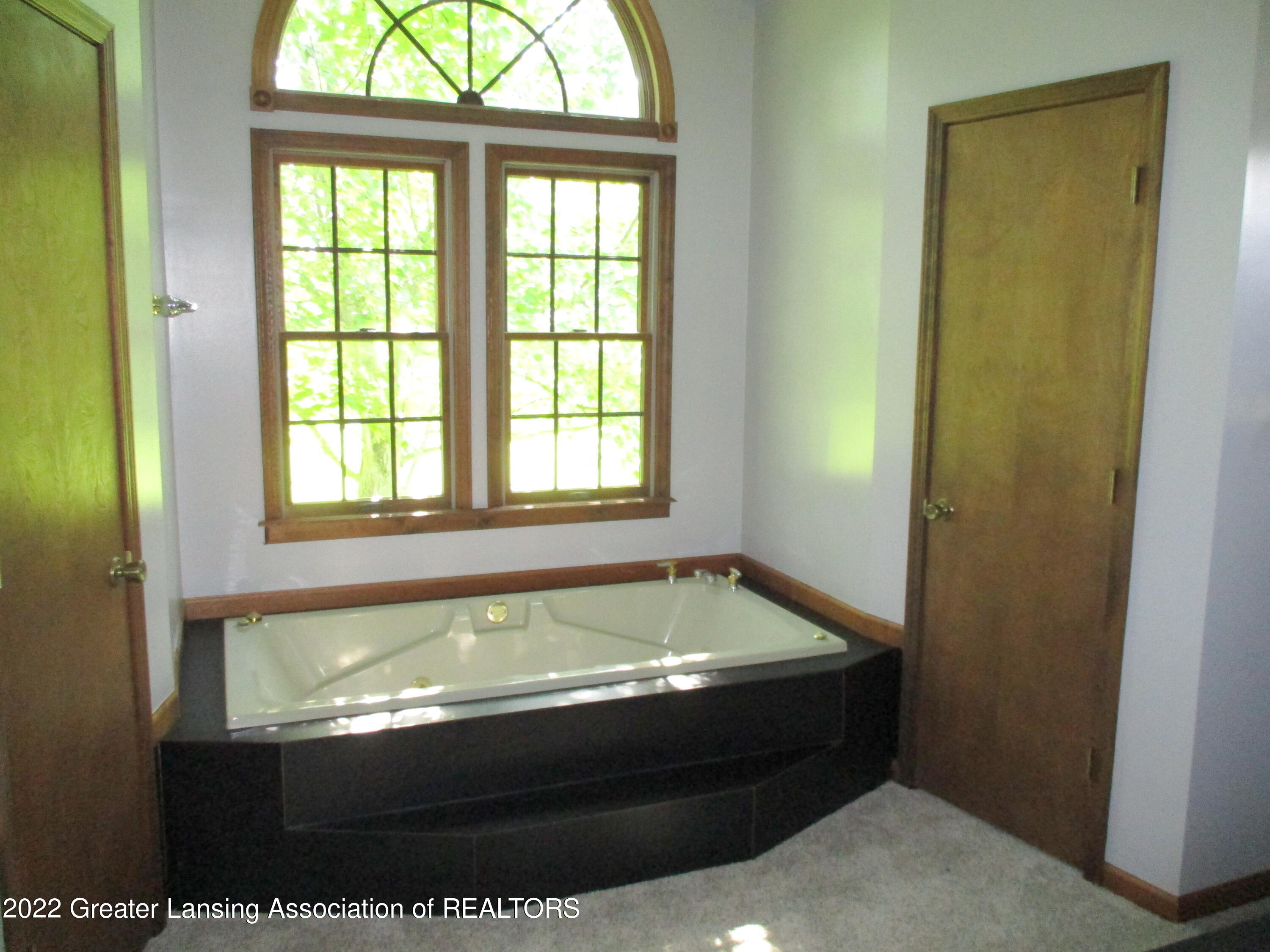 1134 South Stewart Road Charlotte, MI 48813 - Photo 16 of 26 16 Primary Bath