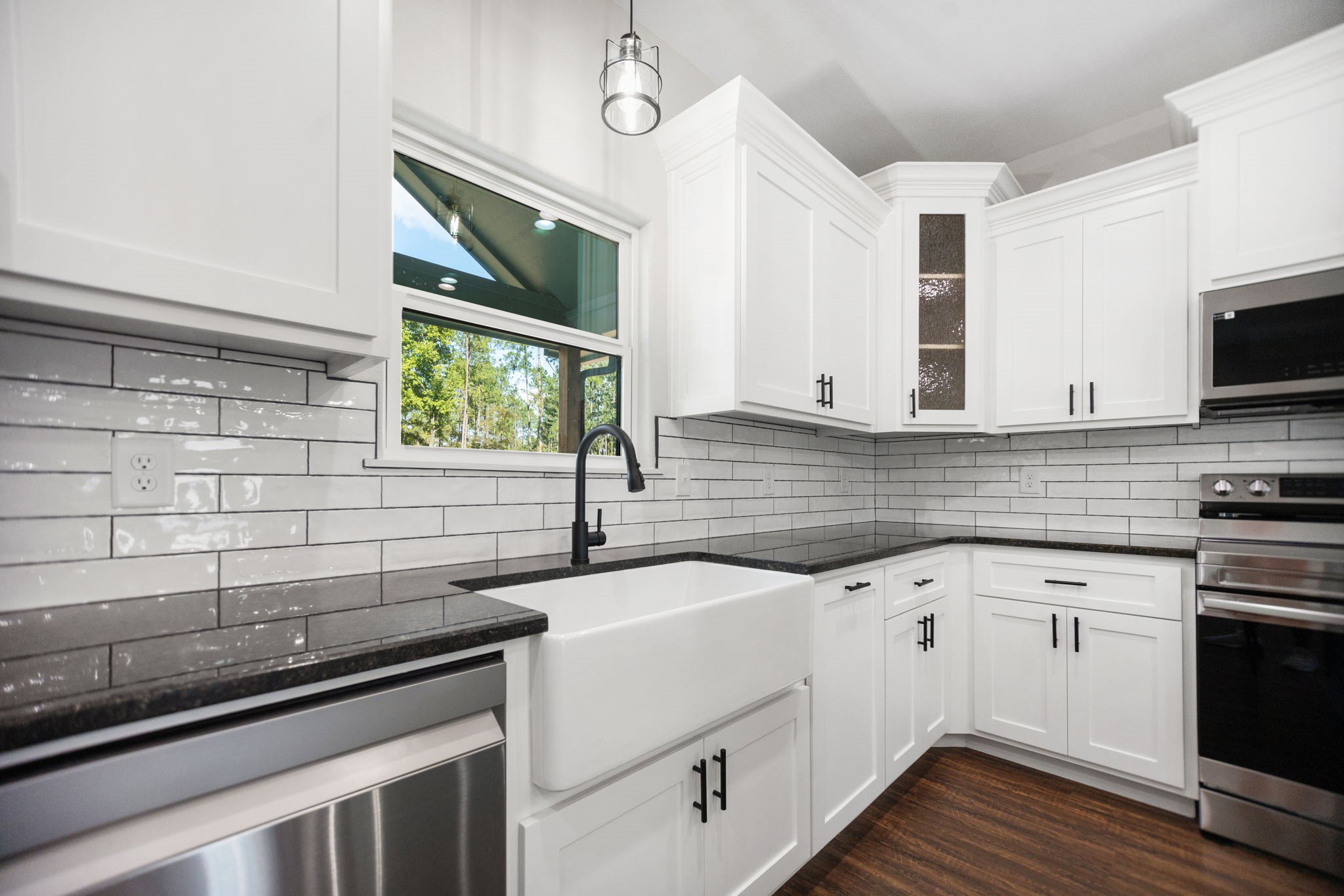 1575 Fm 844 Huntington, TX 75949 - Photo 15 of 40 a kitchen with a sink stove and microwave