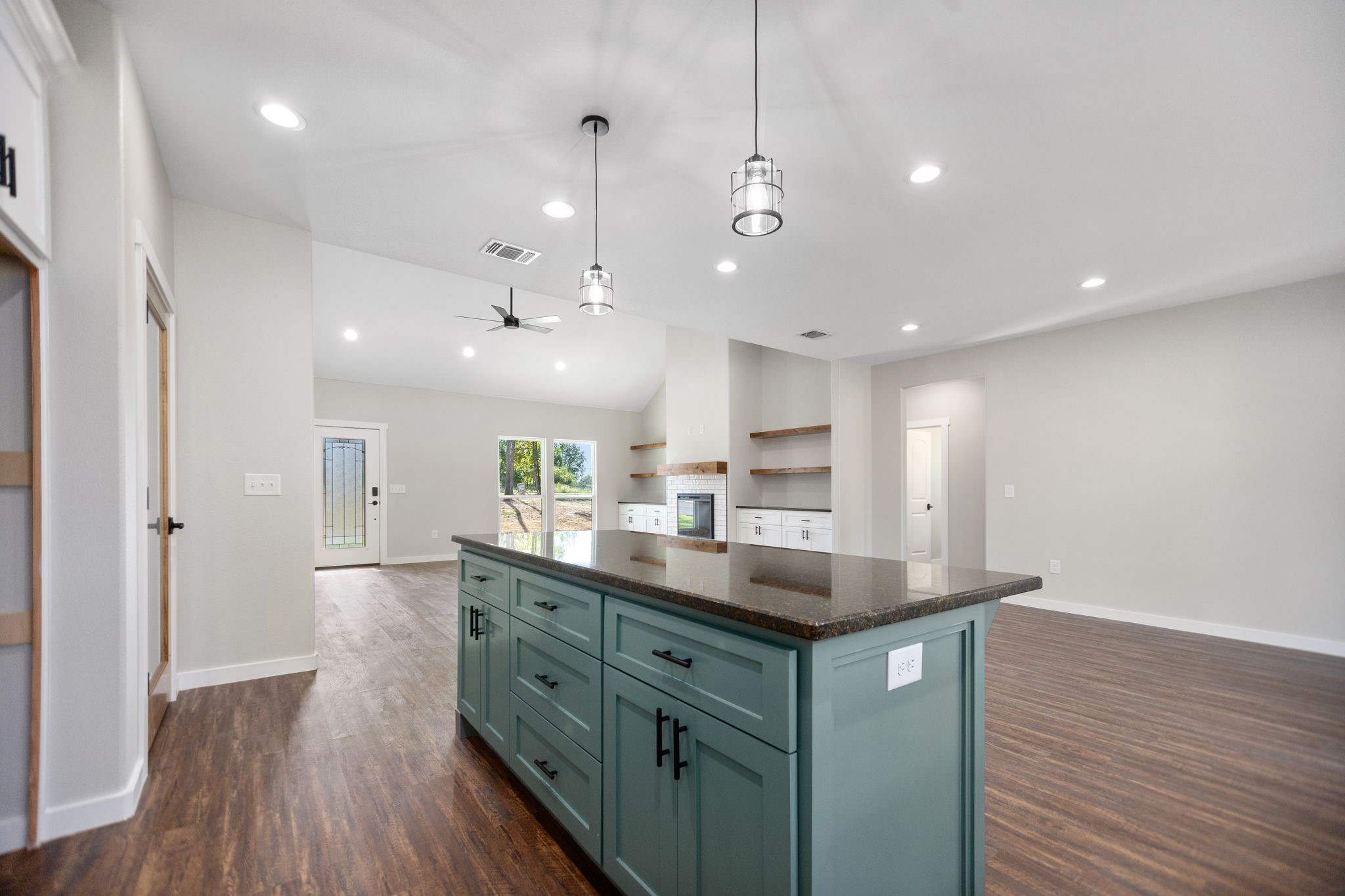 1575 Fm 844 Huntington, TX 75949 - Photo 16 of 40 a kitchen with kitchen island a sink and a stove top oven