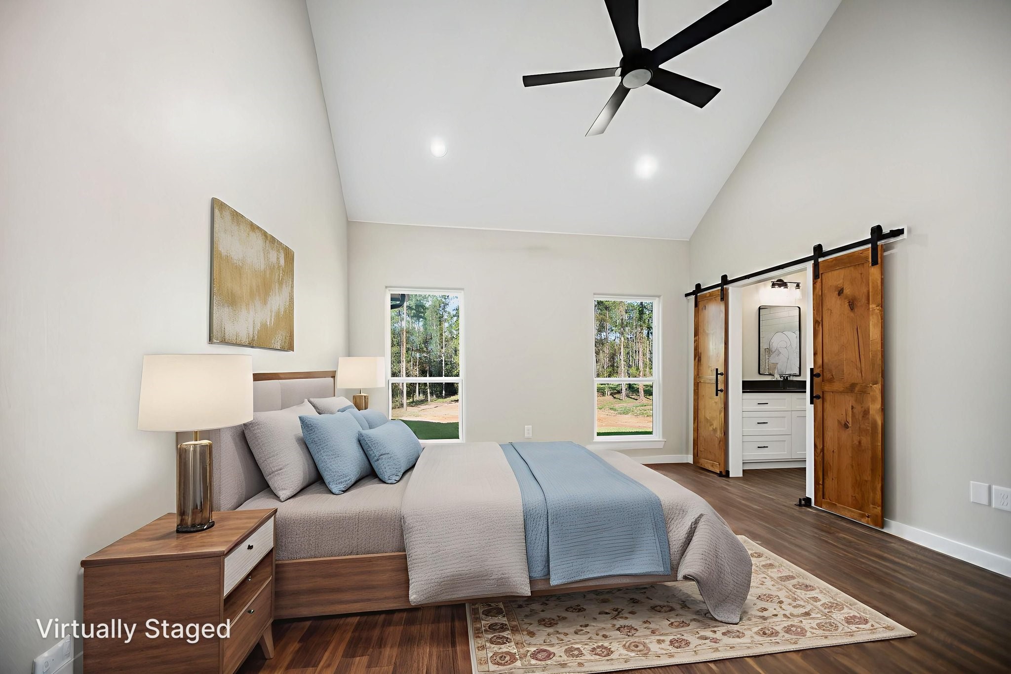 1575 Fm 844 Huntington, TX 75949 - Photo 22 of 40 a spacious bedroom with a bed and a walk in closet