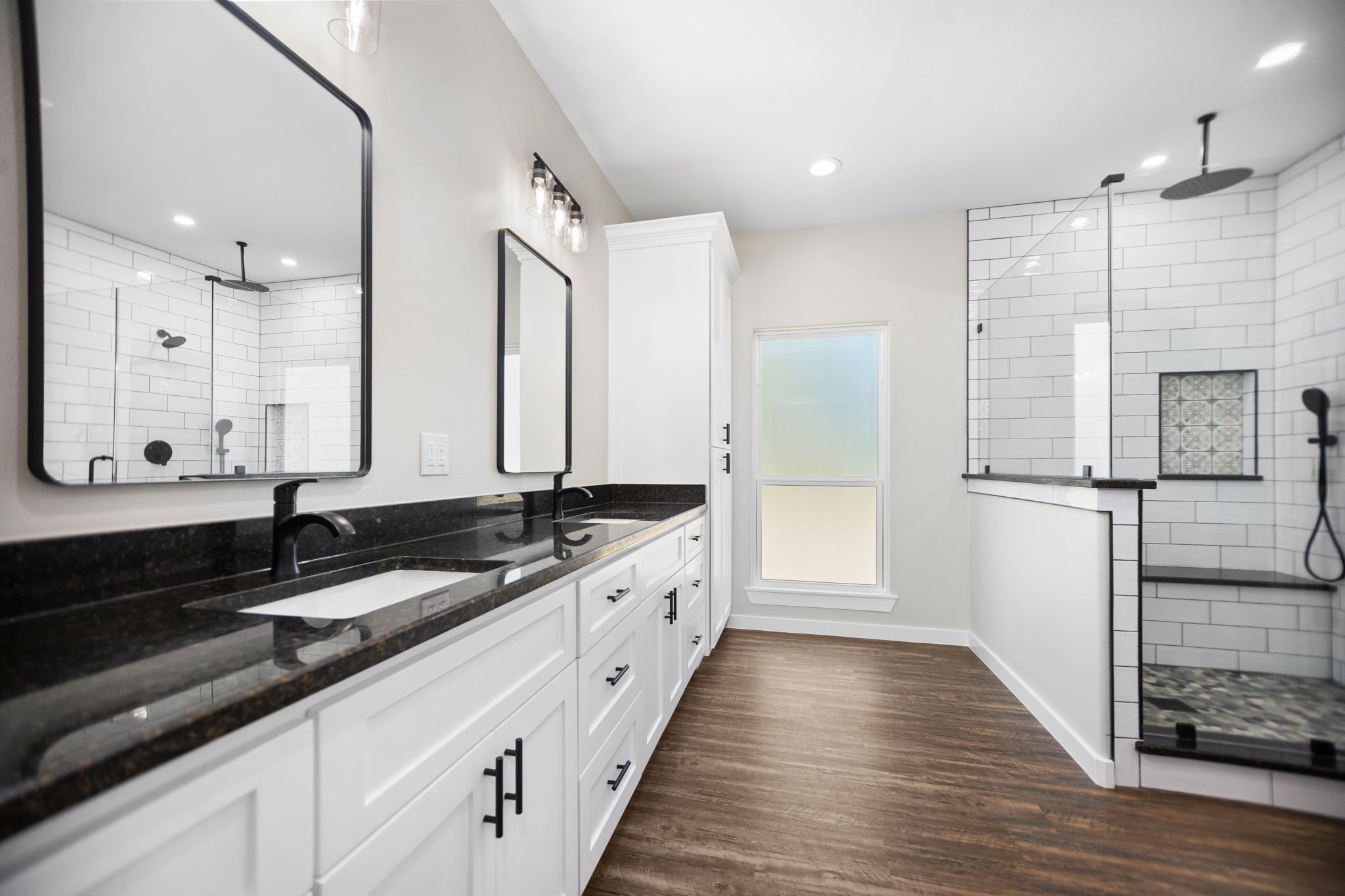 1575 Fm 844 Huntington, TX 75949 - Photo 24 of 40 a large bathroom with double vanity and mirrors