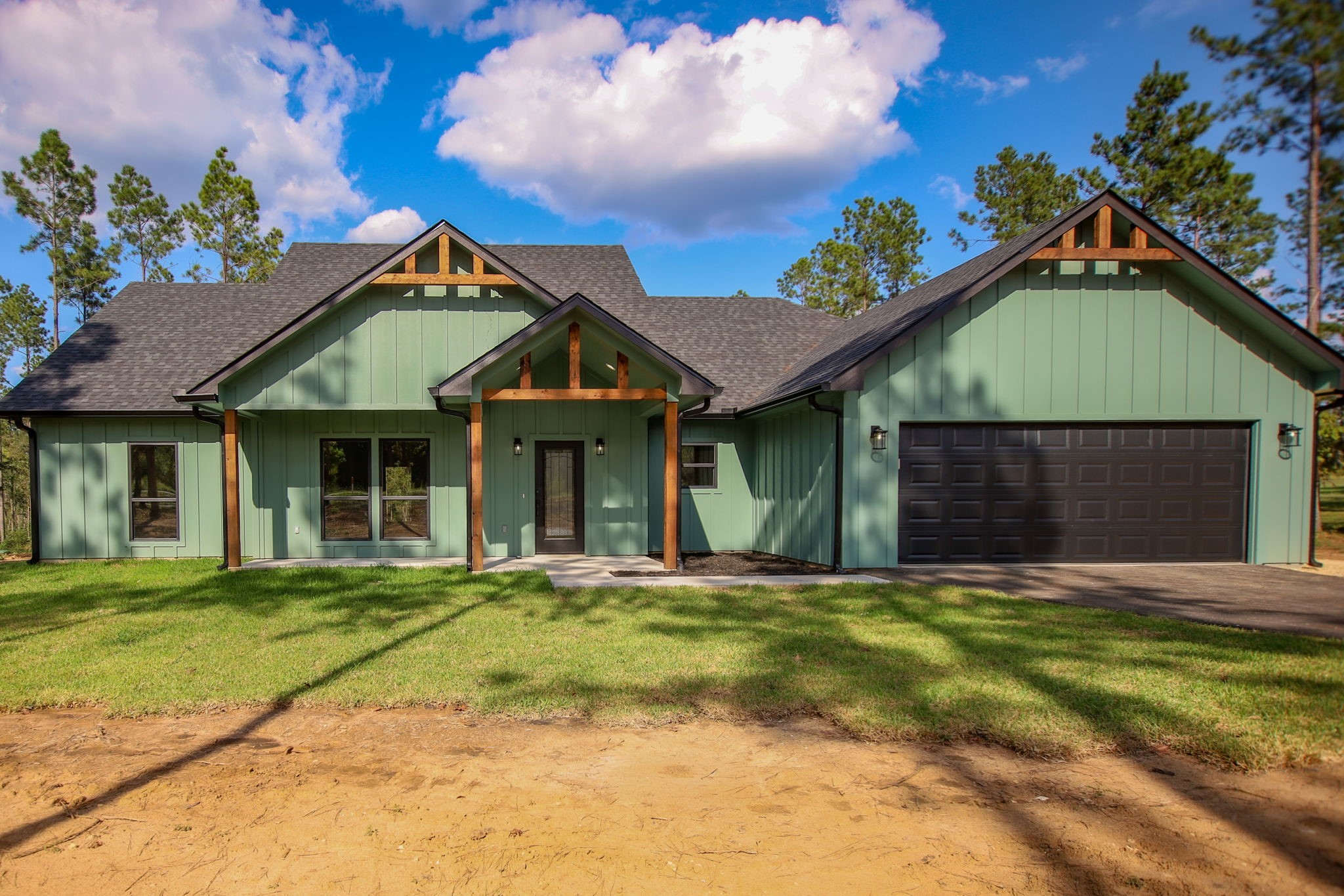 1575 Fm 844 Huntington, TX 75949 - Photo 3 of 40 a front view of a house with a garden